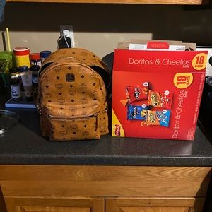 MCM SMALL STUDDED BACKPACK